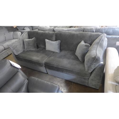 1502 - A Halley magnesium upholstered four seater sofa