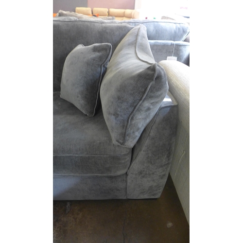 1502 - A Halley magnesium upholstered four seater sofa