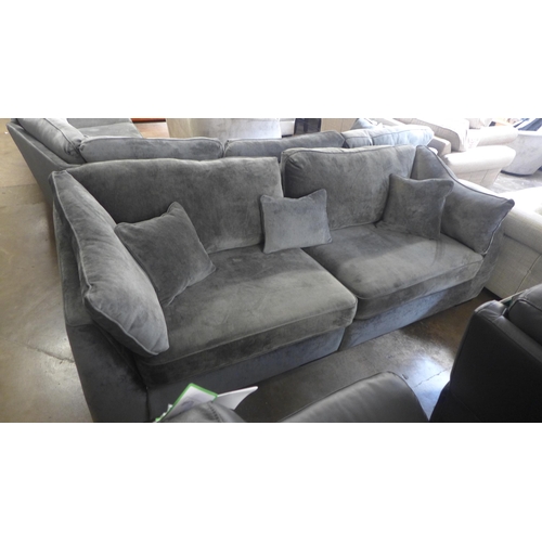 1502 - A Halley magnesium upholstered four seater sofa