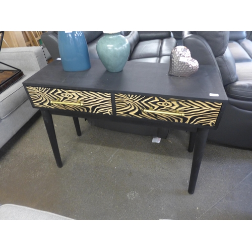 1510 - A console table with zebra design - damaged leg