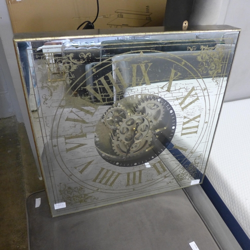 1516 - A mirrored moving gears wall clock