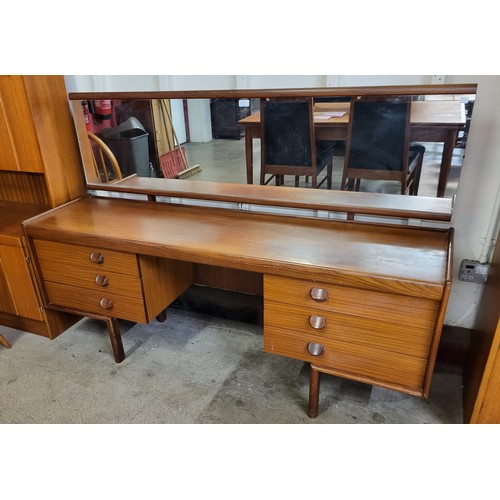 74 - A White & Newton teak dressing table