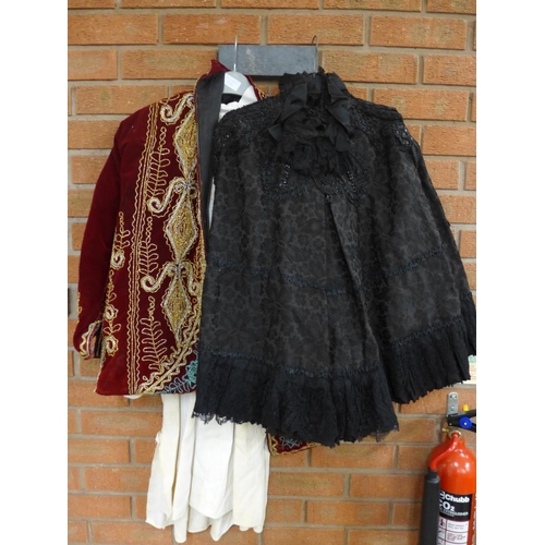 1084 - A Victorian black cape and a red velvet and gold and silver thread jacket, etc. **PLEASE NOTE THIS L... 