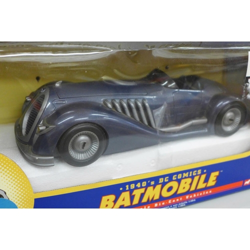 606 - Four model cars including Corgi 1940's DC Comics Batmobile, Signature Models, Sun Star and Haynes Ja... 