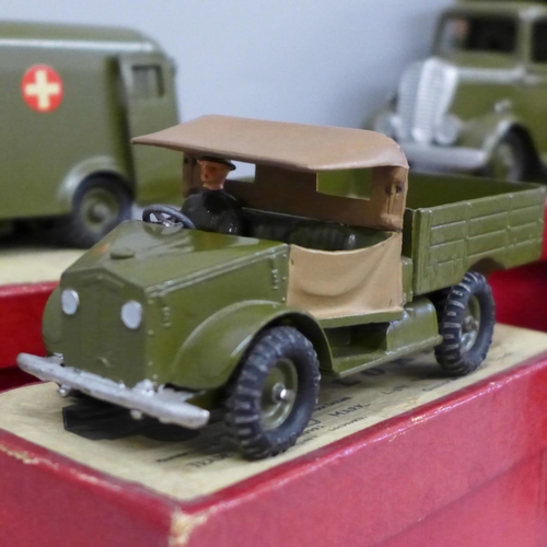 615 - Four Britains model vehicles, boxed; an Army Lorry, Army Covered Tender, Beetle Lorry and an Army Am... 