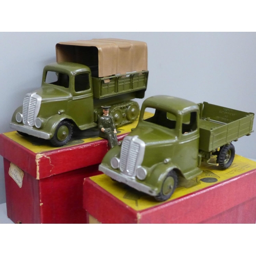 615 - Four Britains model vehicles, boxed; an Army Lorry, Army Covered Tender, Beetle Lorry and an Army Am... 