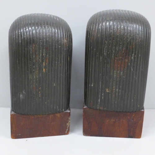 619 - A pair of Egyptian Pharoah head wooden bookends