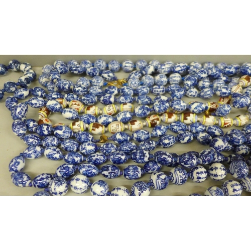 649 - Fifteen porcelain bead necklaces