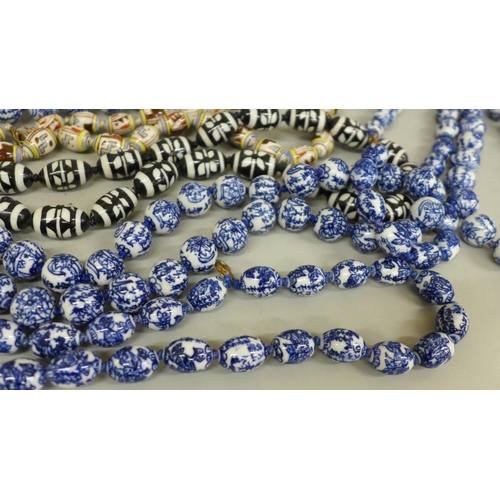 649 - Fifteen porcelain bead necklaces