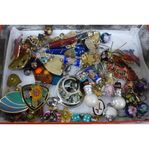 651 - A collection of brooches and earrings