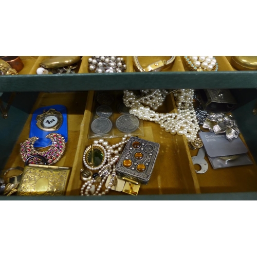 654 - Fashion and costume jewellery in a jewellery box