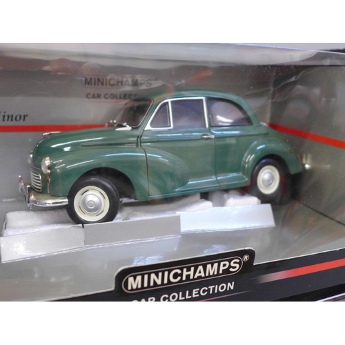 655 - Four 1/18 scale model cars comprising Motor City Classics, Minichamps, Jadi and American Missile