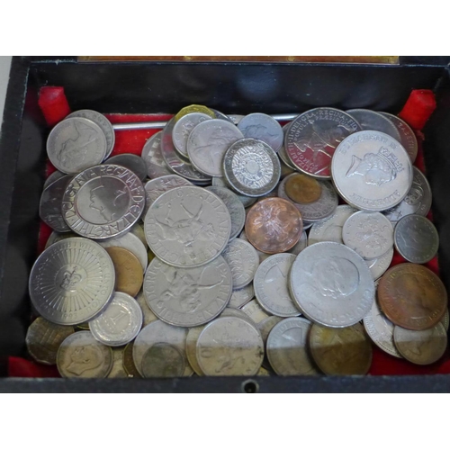 662 - A collection of coins including three £5 coins, four Guernsey and Alderney £5 coins, Churchill crown... 