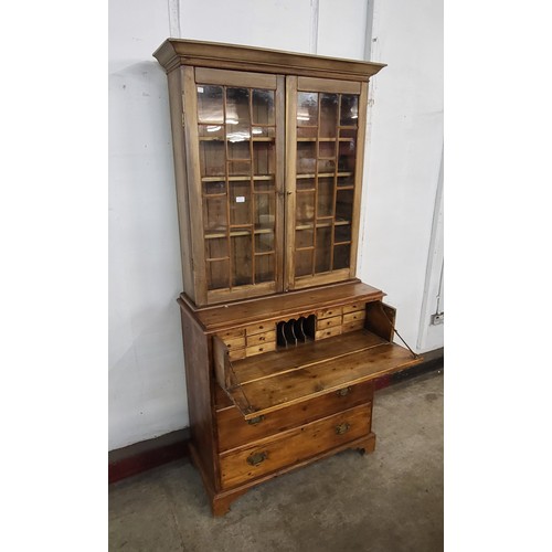 122 - A George III style pine and beech secretaire estate cupboard