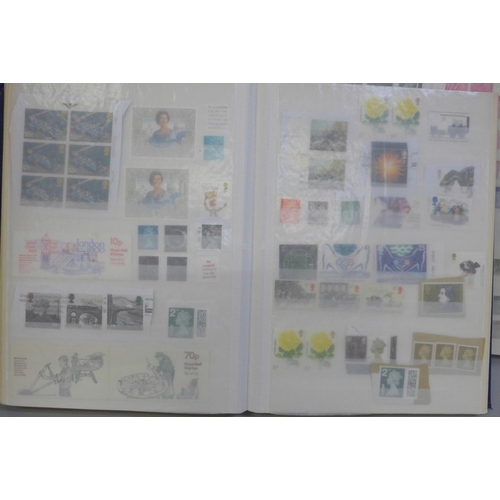 667 - Two albums of GB stamps, mainly mint, (machins and commemorative)