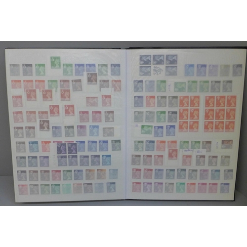 667 - Two albums of GB stamps, mainly mint, (machins and commemorative)