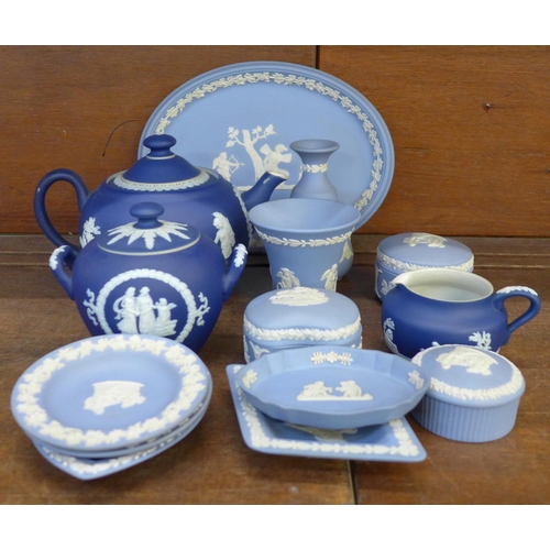 673 - A collection of Wedgwood Jasperware and an Adams Tunstall dark blue Jasper tea service, chip to rim ... 