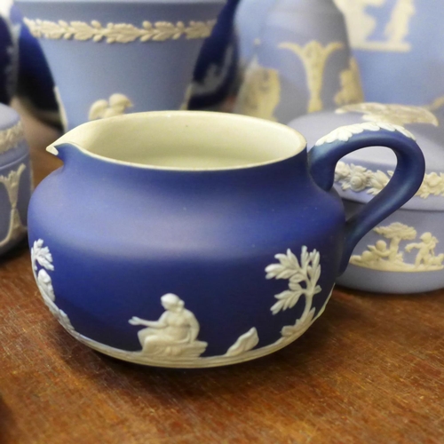 673 - A collection of Wedgwood Jasperware and an Adams Tunstall dark blue Jasper tea service, chip to rim ... 