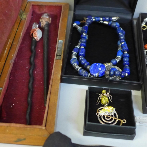 675 - A collection of jewellery including new age and two wands