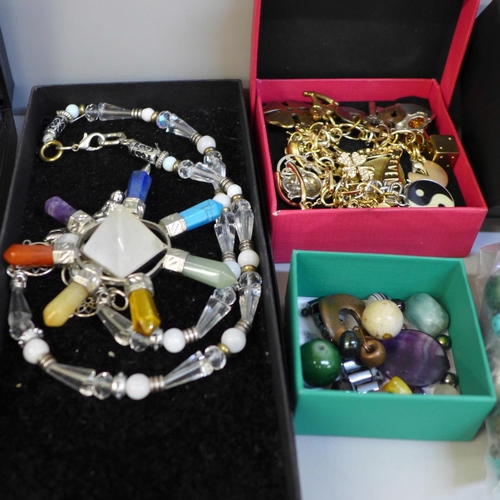 675 - A collection of jewellery including new age and two wands