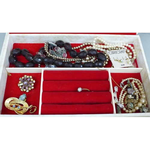 694 - A jewellery box with contents