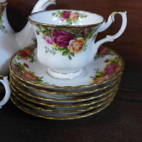 703 - A Royal Albert Old Country Roses six setting tea set, one extra tea cup