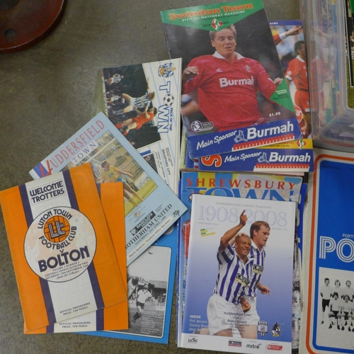 704 - Sporting memorabilia; a large box of football annuals and programmes including England international... 