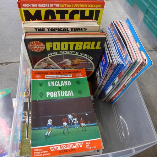 704 - Sporting memorabilia; a large box of football annuals and programmes including England international... 