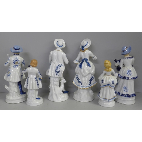 764 - A collection of six blue and white continental figures