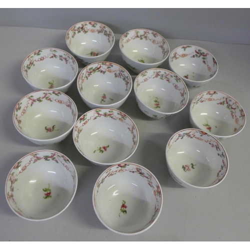 766 - An 18th Century Newhall porcelain tea set which includes tea pot and twelve tea bowls and saucers de... 