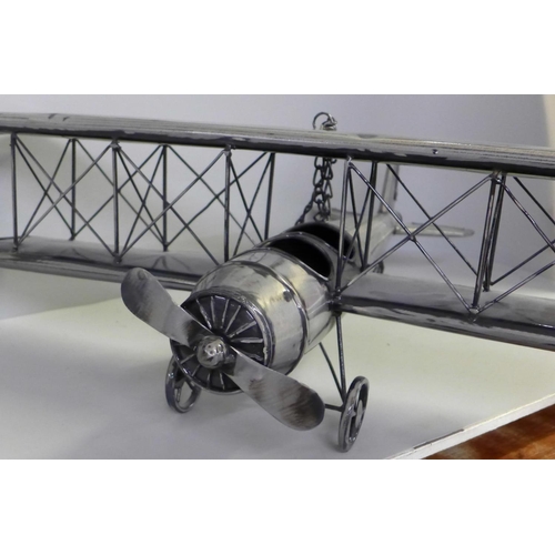 780 - A large modern metal model of a bi-plane