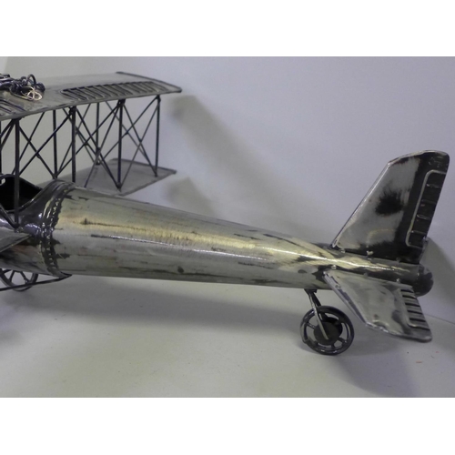 780 - A large modern metal model of a bi-plane