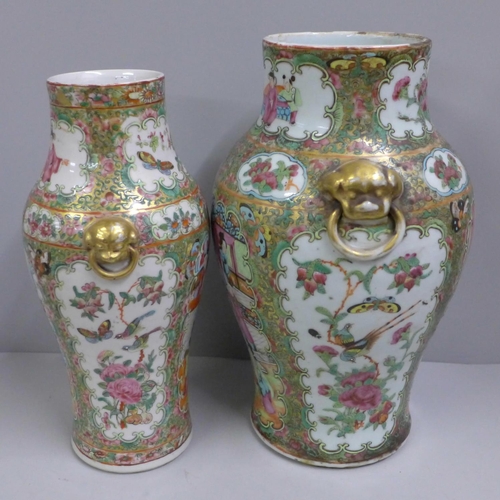 781 - Two 19th Century Chinese Export famille rose vases and covers, tallest 34cm