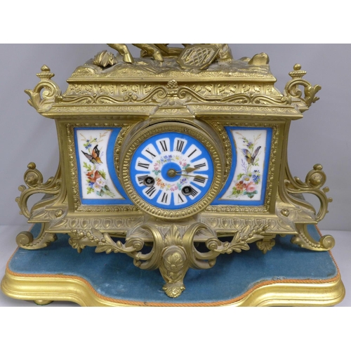 791 - A French 2nd Empire style mantel clock with a gilt spelter ornamented case, circa 1860, the case wit... 