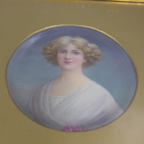 795 - A gilt framed porcelain plate with hand painted portrait, signed Leslie Johnson