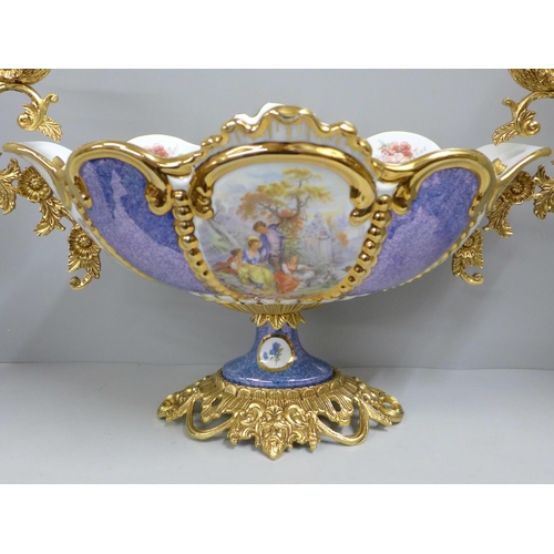 796 - A modern continental gilt and ceramic table centrepiece, 52cm overall width