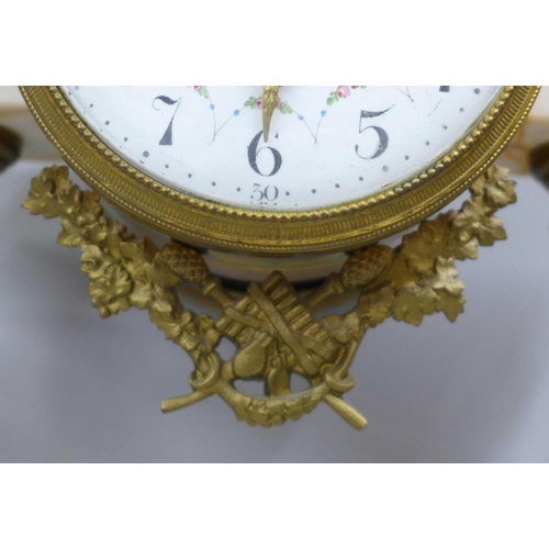 798 - A French white marble and gilt metal clock garniture with porcelain dial, 38cm