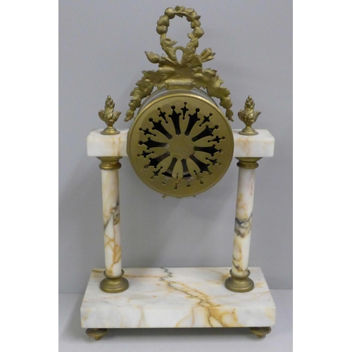 798 - A French white marble and gilt metal clock garniture with porcelain dial, 38cm