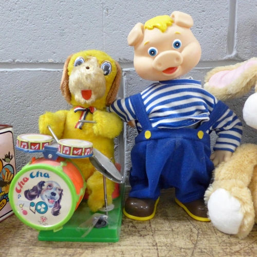 799 - Two jack in the box, battery operated clowns, walking pig, bear, rabbit and gorilla (10)