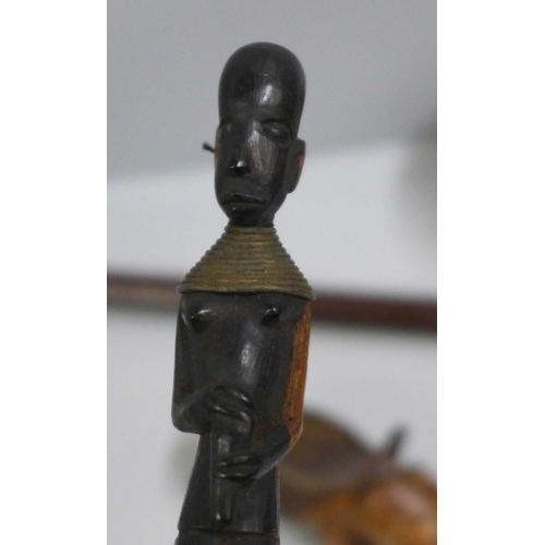 807 - An African knobkerrie (fighting stick) and other carved wooden items