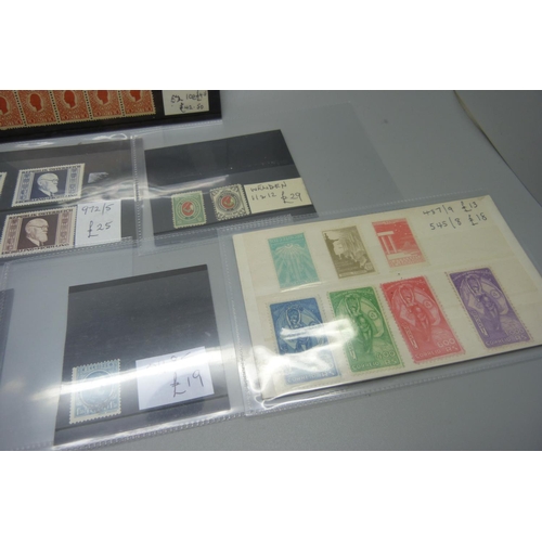 822 - Stamps; better stamps and sets on 20 stock cards, (all identified and catalogued at over £1,500)