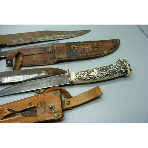 823 - Five knives including one with antler handle