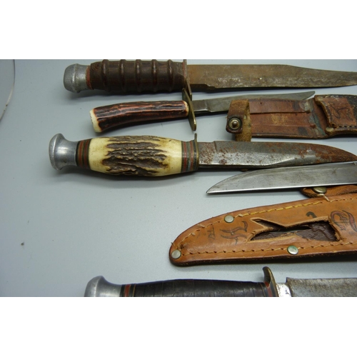 823 - Five knives including one with antler handle