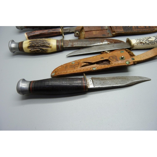 823 - Five knives including one with antler handle