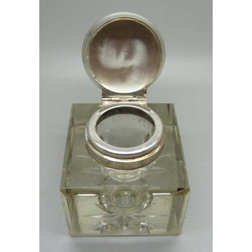 837 - A silver topped glass inkwell, Birmingham 1903