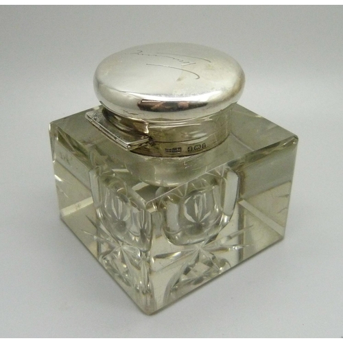 837 - A silver topped glass inkwell, Birmingham 1903