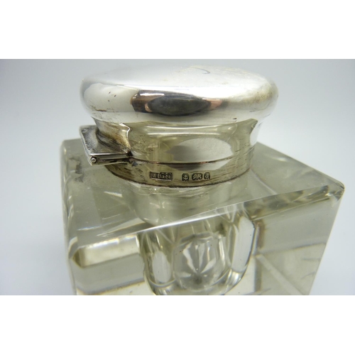 837 - A silver topped glass inkwell, Birmingham 1903