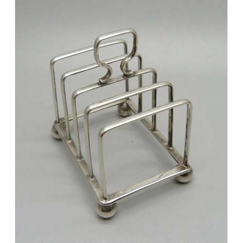 838A - A silver toast rack, London 1906, 44g