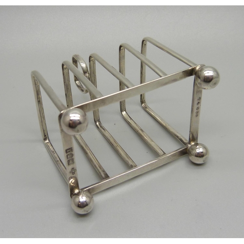 838A - A silver toast rack, London 1906, 44g