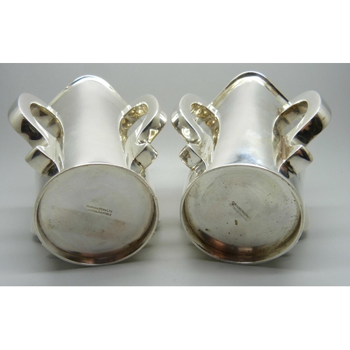 840 - A pair of silver Mappin & Webb Irish Mether four handled vessels, Sheffield 1938, 620g total weight,... 